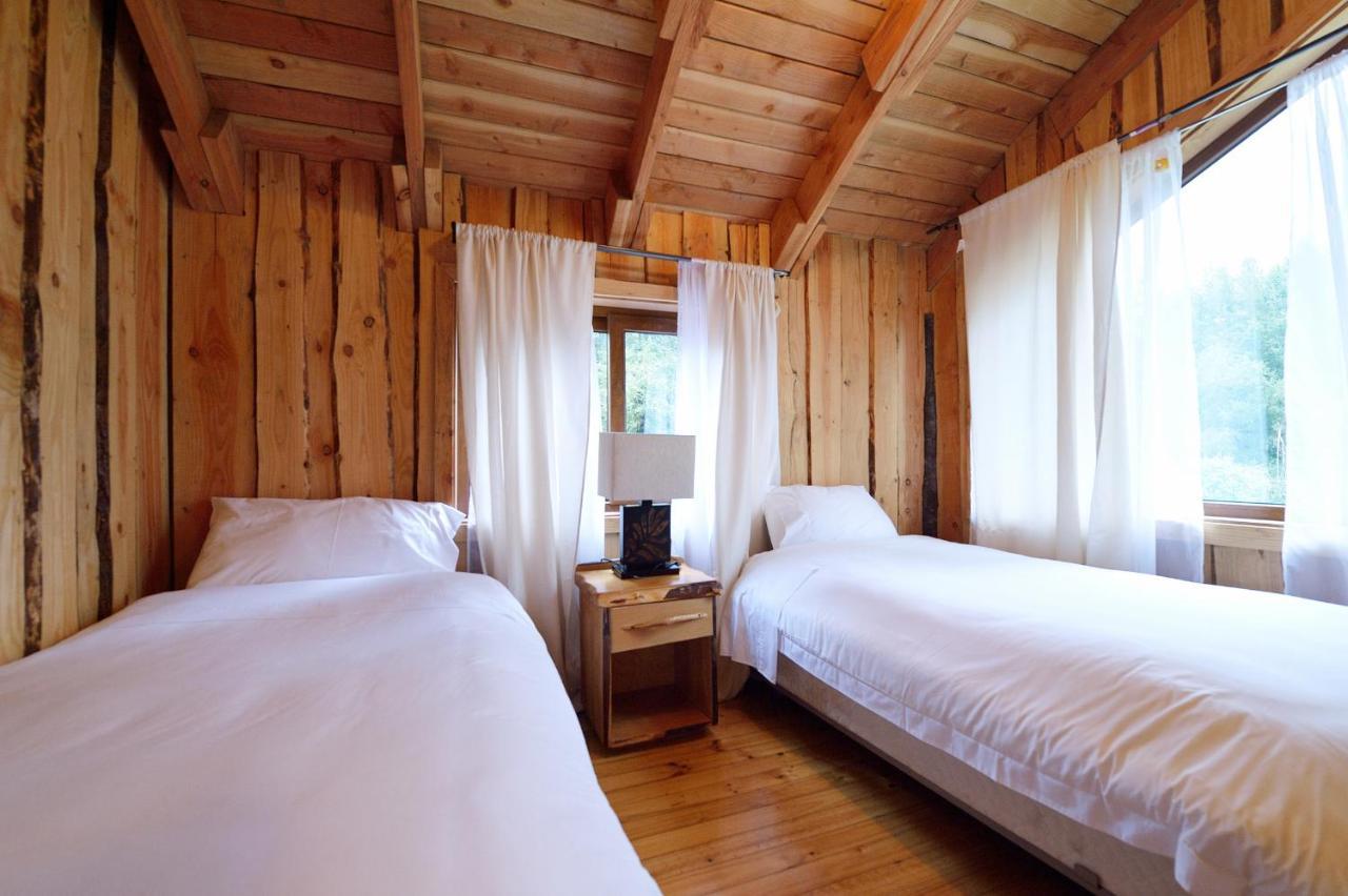 Huilo Huilo Cabanas Del Bosque Puerto Fuy Ruang foto